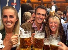 Groom enjoying his beer in company of stunning German girls